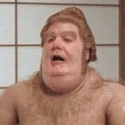 just a fat old man sitting on the couch eating doritos.