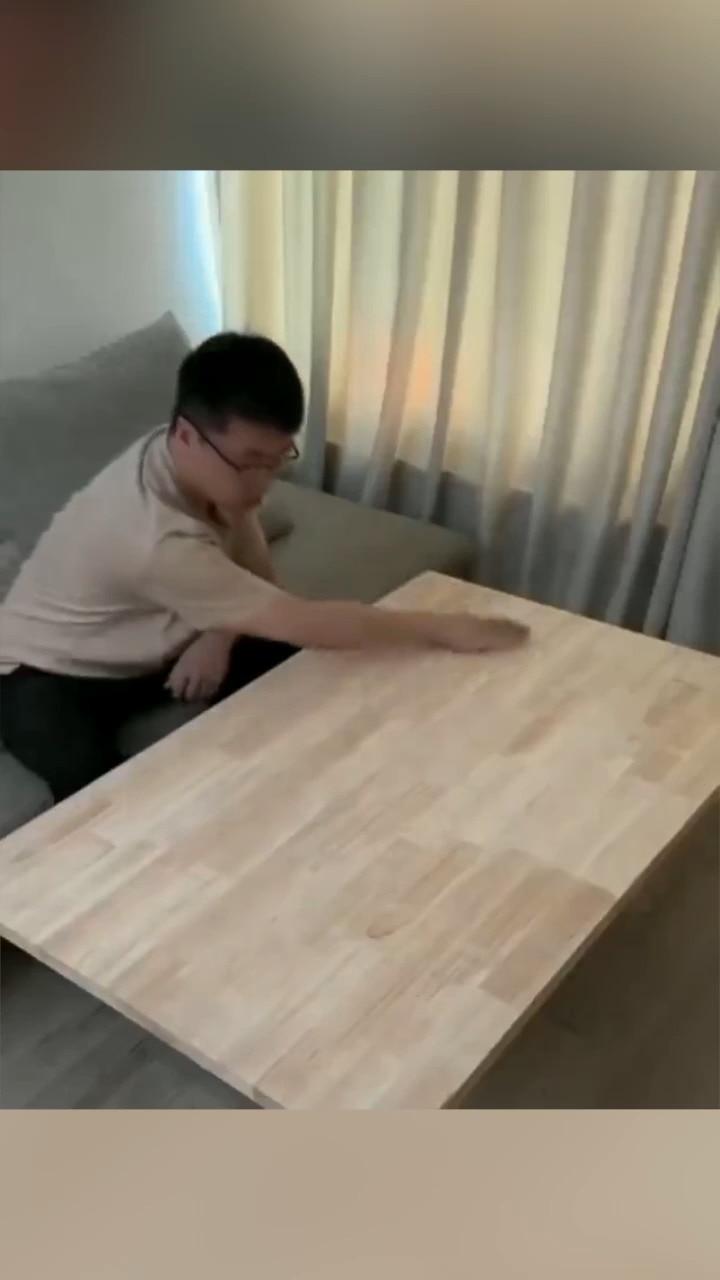 A coffee table with printed cast-in hexagon panels that can be individually illuminated