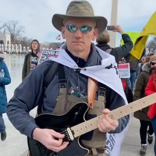 Pickin' and grinnin' my way to freedom!