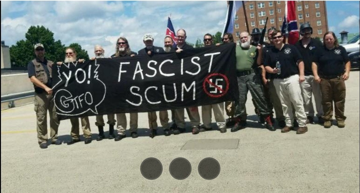 CAPTION THIS: Dissident Right warriors as we are called ... defended and defeated antifa scum and blm scum in the streets of Charlottesville, VA on 12 August 2017 and took one of the leftist's banners as a prize possession. Of sorts: capturing the enemy's flag. What a glorious day! The League of the South has the strongest leaders in this movement and by far we are the only organization standing with the same leaders after Charlottesville. Yahweh bless our leaders and may you continue to guide our organization.