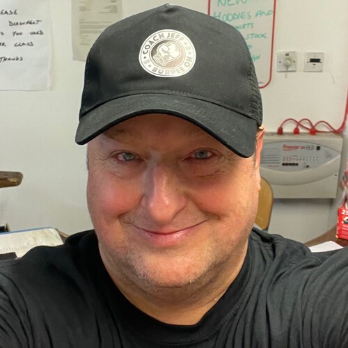 American who lives in Edinburgh.  “A” Political