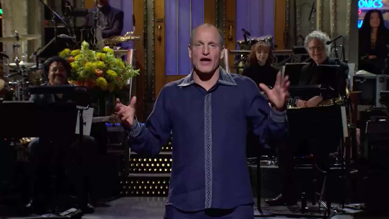 NEW - Woody Harrelson on SNL: "The biggest drug cartels in the world get together and buy up all the media and all the politicians and force all the people in the world to stay locked in their homes, and people can only come out if they take the cartel's drugs.