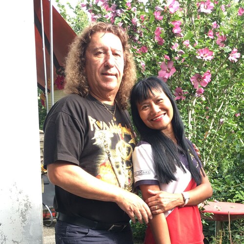 Western European, living in southeast Asia.