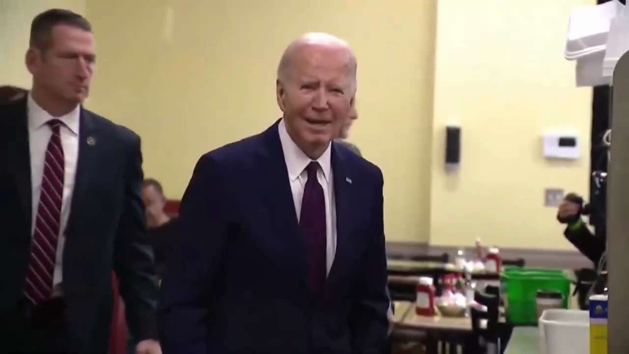 Los Angeles Mayor Karen Bass steps in to answer a question for President Biden as he looks confused ...