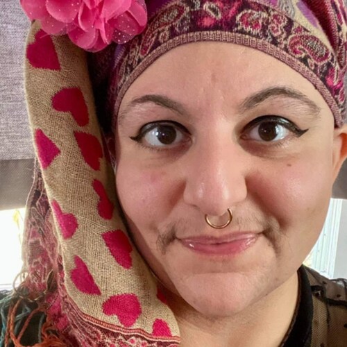 Gender fluid , sissy  , social justice activist and Curling team captain. 
They/them usually