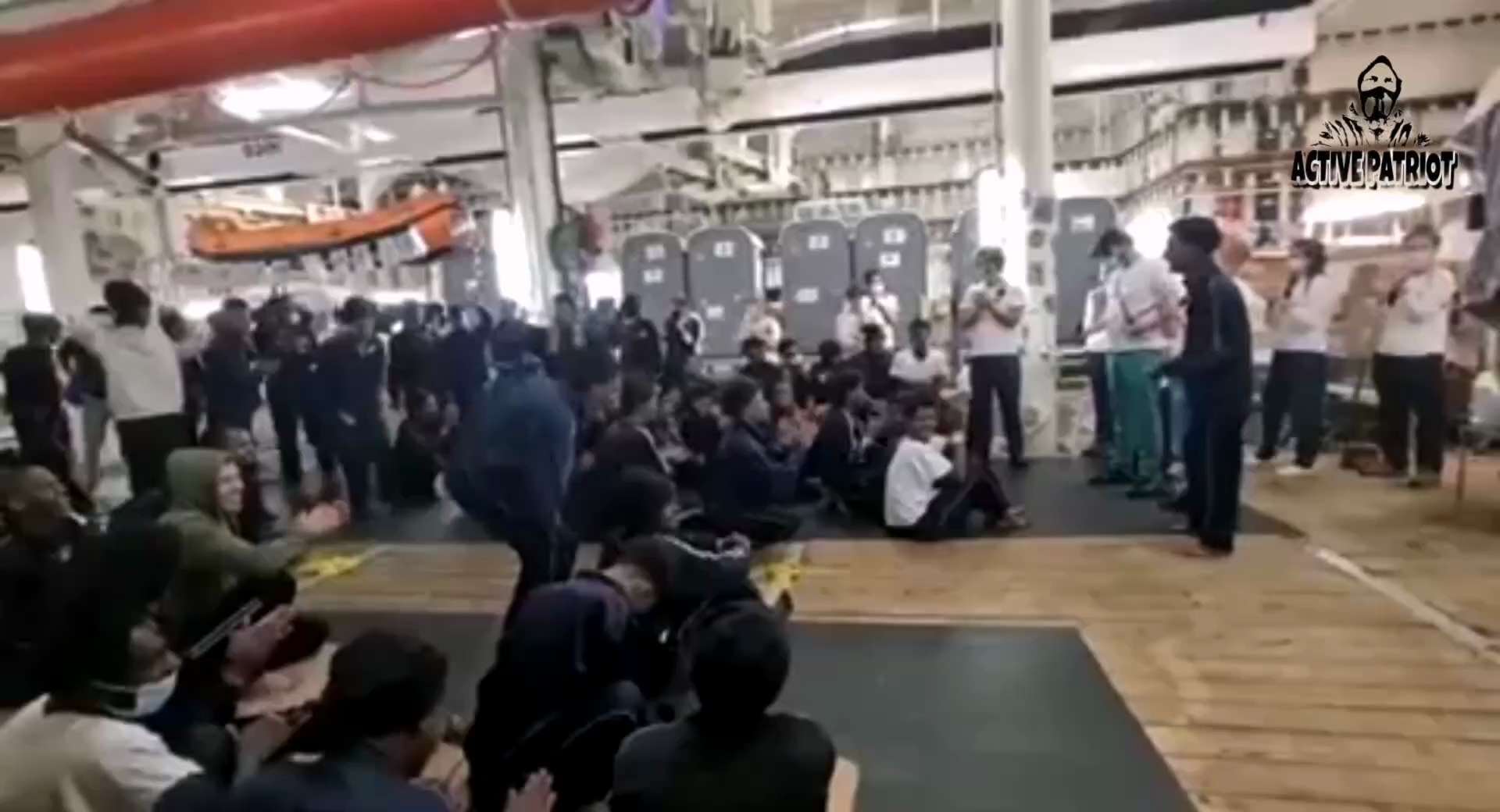 Africans who’ve been picked up off the coast of Libya are told by NGO people smugglers they’ve been ...