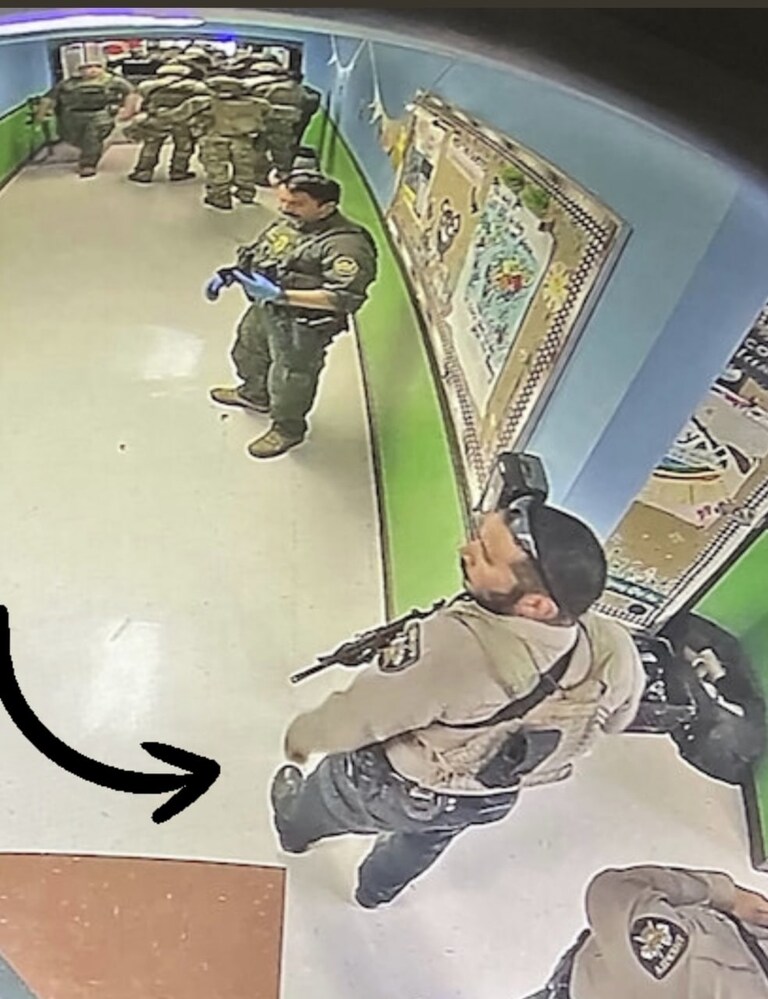BREAKING: New photo from inside Uvalde school reportedly shows Sheriff’s Deputy Rubio and others standing around in hallway while gunman shot students, inc
