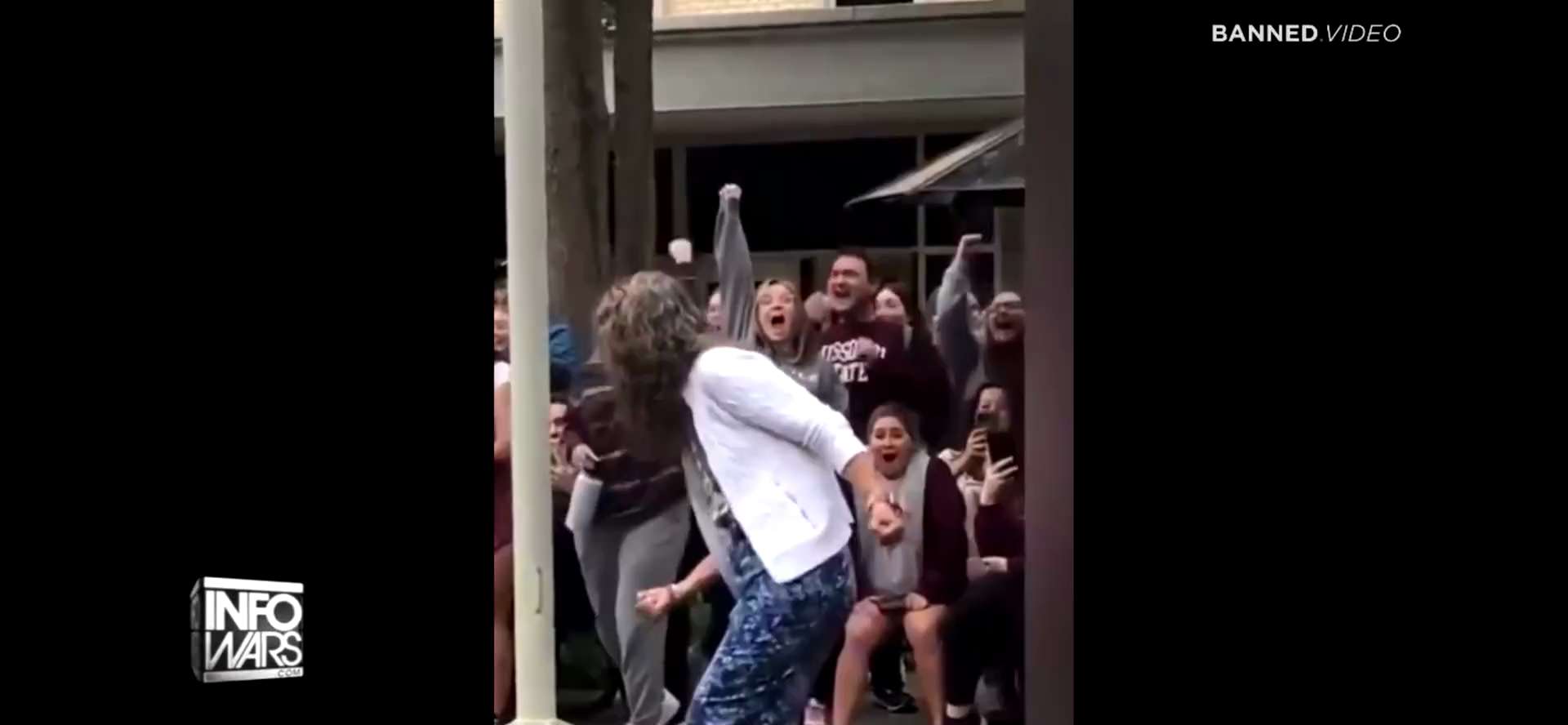 Must be on Missouri State U’s campus, based on the clothes they have on in the back ground. Absolute...