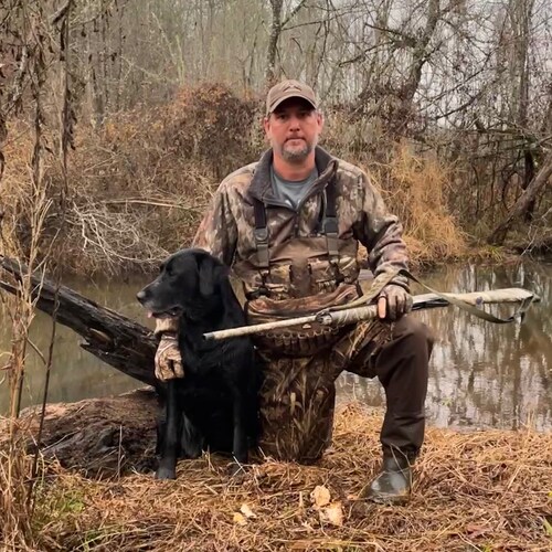 happy father and husband who loves the outdoors and my three labs.