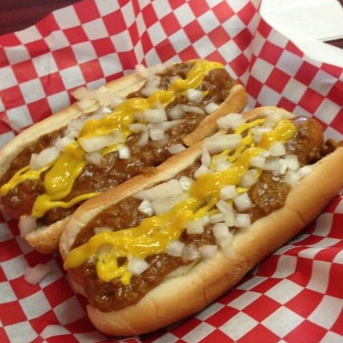 Fancy Hot Dog 🌭 covered with hamburger meat, chili, onions and melted cheese.