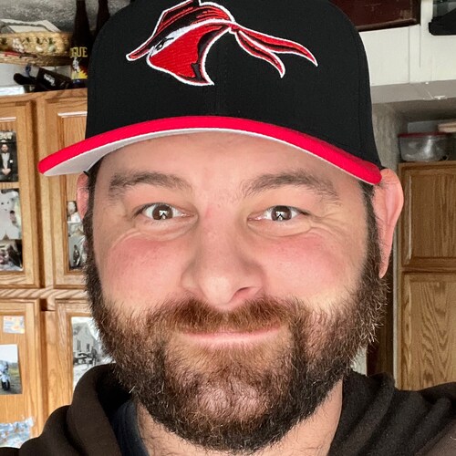 Iraq Veteran, Husband, Father, Postman.