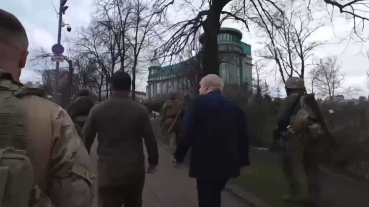 Johnson and Zelenskyy casually strolling around Kyiv, Ukraine, not a bullet hole or bomb crater in s...
