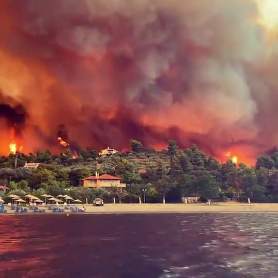 NEW - Raging wildfires amidst scorching heat continue to burn around Greece. Evia Island is in criti...