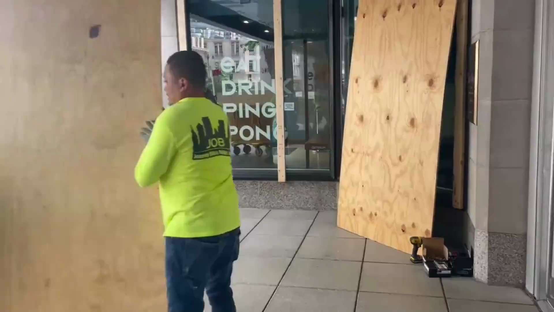 Nightfall Approaches: D.C. Businesses Board Up Their Windows in Light of Roe v. Wade Ruling

Sourc...