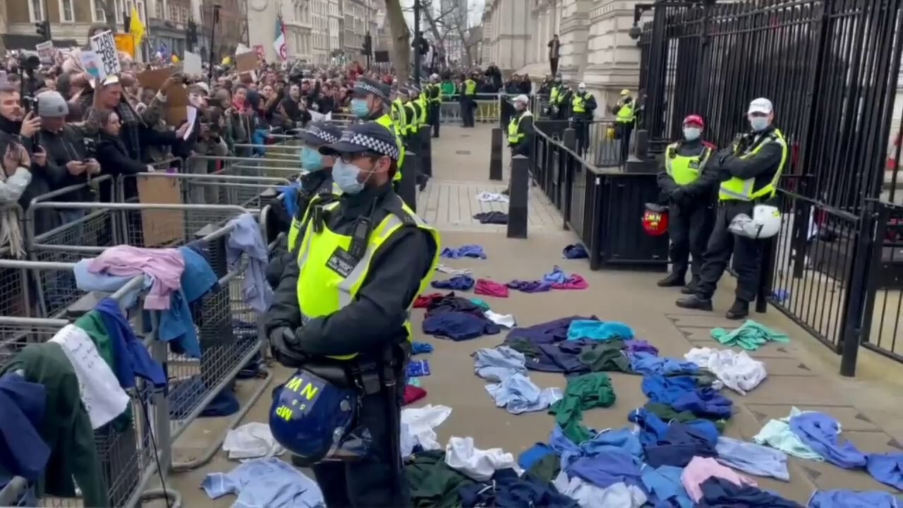 More footage of NHS staff and care workers throwing their uniforms at downing Street as they're being sacked for not getting injected with the experimental covid jab.