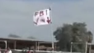 BREAKING: Somebody is flying an "FBI Check-In" flag at the Trump rally in Arizona