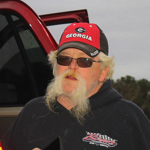dirt racing fan, proud American and photographer