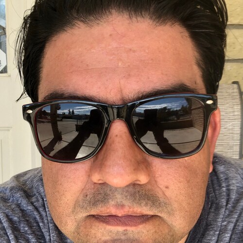 Reagan conservative. Son of immigrants parents. Father of Four. Married 24 years.