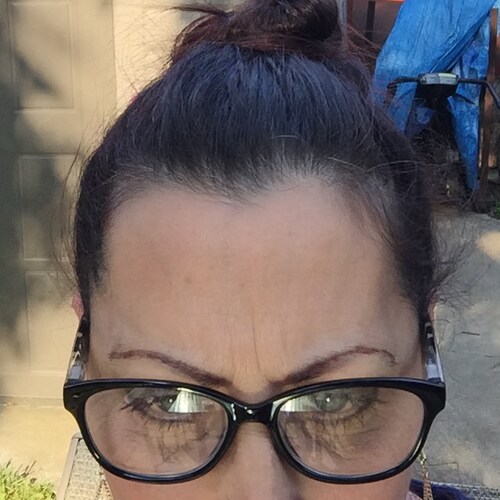 So many books, so little time. A patriot with a messy bun!