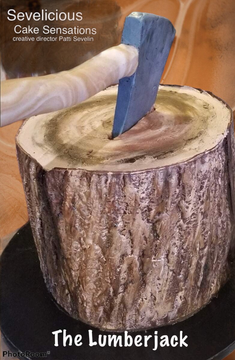 Just a little something different than politics!! All cake covered in modeling chocolate the ax hand...