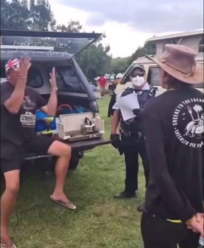 Police doing the rounds at the encamped convoy outside Parliament House in Canberra Australia.

KEEP...