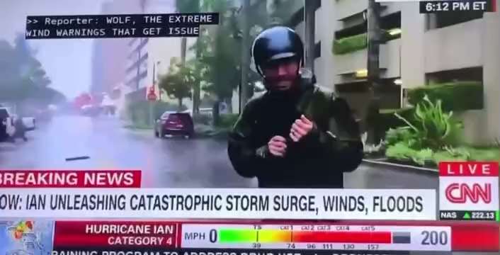 CNN anchor apt helmet.

Check the guy in the background calmly strolling to his car 😂