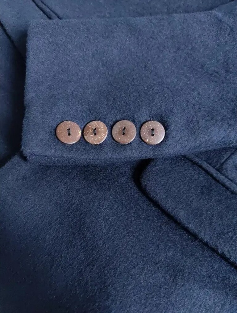 The buttons on our overcoat are made from coconut shells 🥥 These are one of the most eco friendly options for clothing buttons 🌿

It's an entirely natura