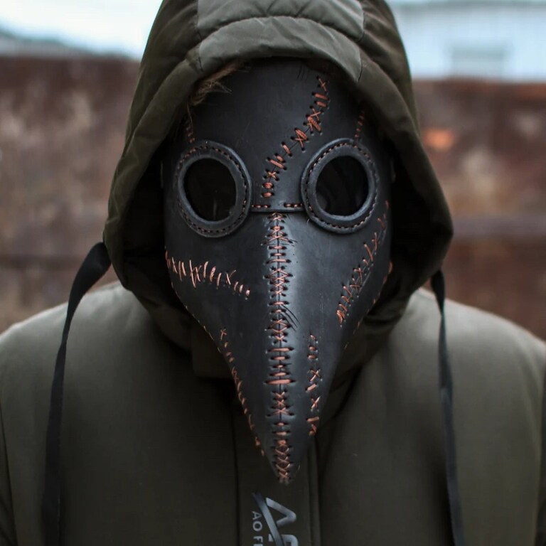 A Mask of the superstitious people of the Middle Ages. A mask is a mask. A superstition is a superstition. 