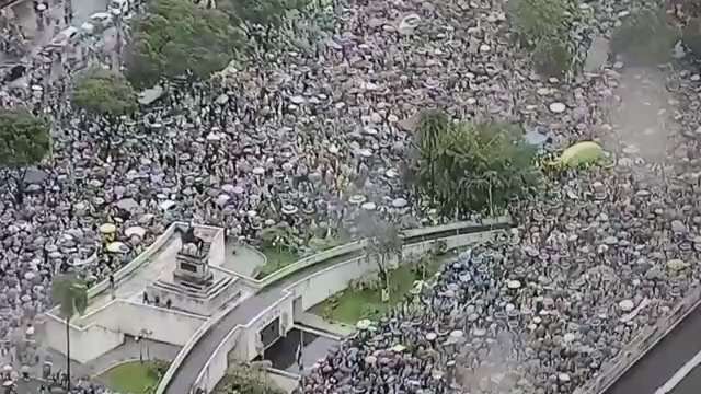 Mass protests across Brazil, besieging the military command in Rio de Janeiro.

They tell the milita...