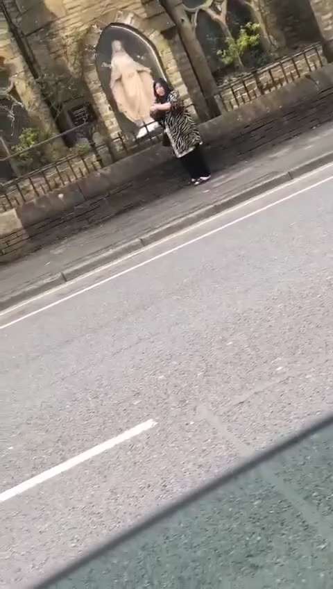 Muslim woman throwing rocks at a church on Bradford yesterday. 

Imagine the uproar if it was Christ...