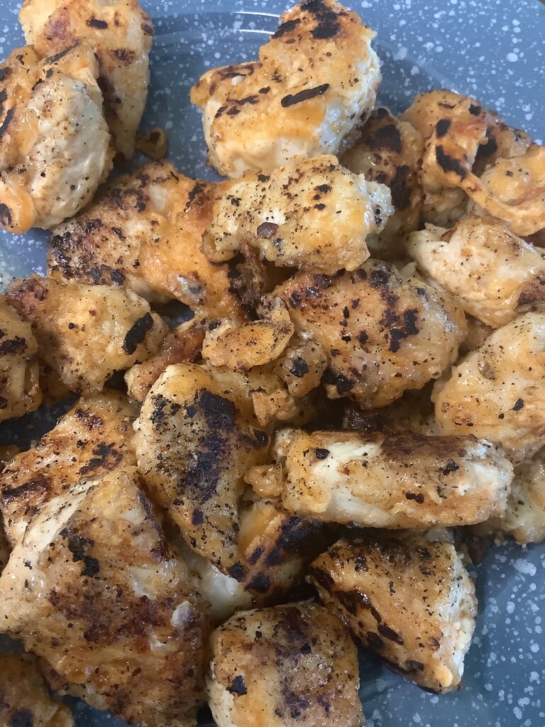 #chicken #nuggets #marinated #buffalo #sauce #24hrs coat in #cornstarch #cook on #blackstone or any #griddle. Dare I say, better than fried.