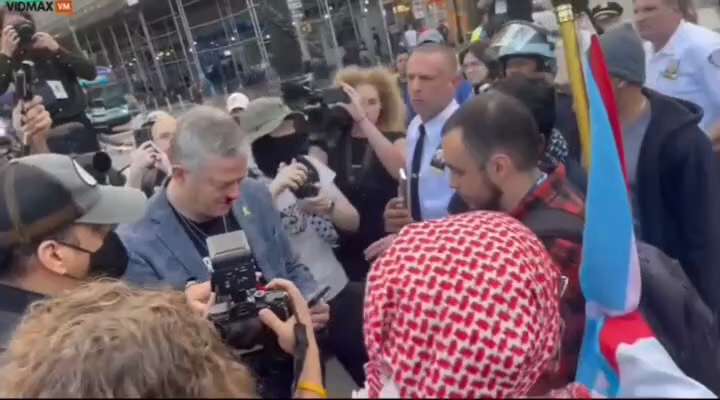 WiseEnough on GETTR : A man was left bleeding after an altercation with pro-Hamas demonstrators in New York City on October 7, one year after the Hamas att...