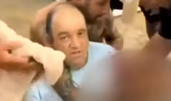 Hero dad-of-two who was filmed risking his life to tackling the gunman during the Bondi Beach terror...
