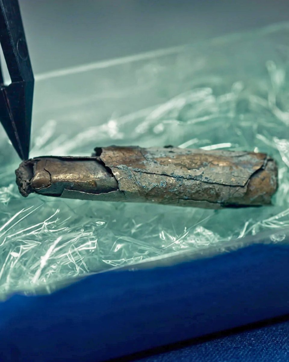 Jack Posobeic:
1700 years later the scroll was read: 

“Holy Holy Holy, in the Name of Jesus Christ,...