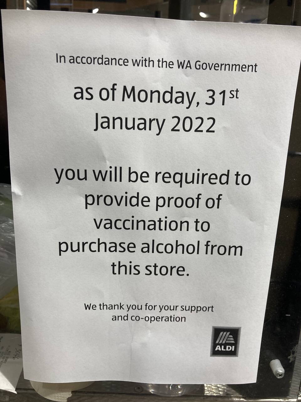 Perth Australia👇 you can buy groceries at Aldi, but must be vaccinated to take a bottle of wine thr...
