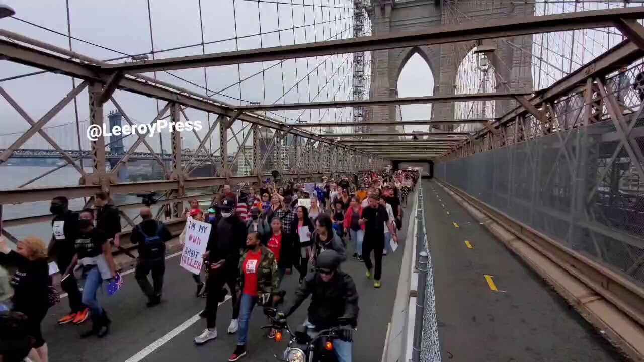 Thousands of New Yorkers take over Brooklyn Bridge in response to teachers who lost their job for no...