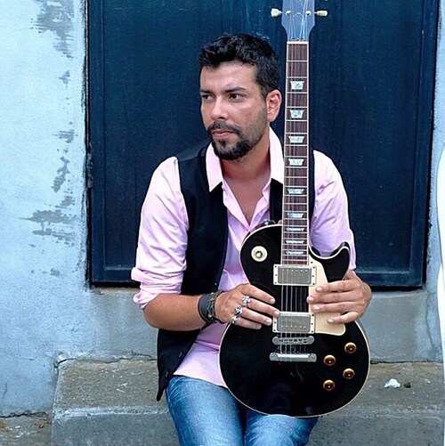 musico, professor e católico