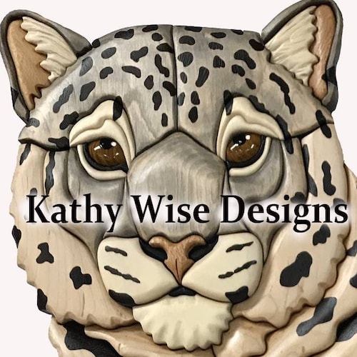 Kathy Wise is a talented intarsia artist who specializes in creating Intarsia woodworking patterns.