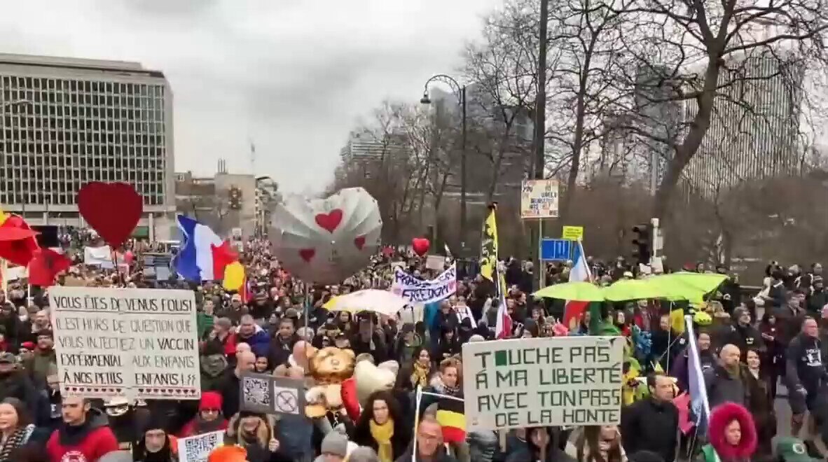 NOW - Large protest against vaccine passports and Covid restrictions in #Brussels, the capital of Belgium the administrative center of the European Union.