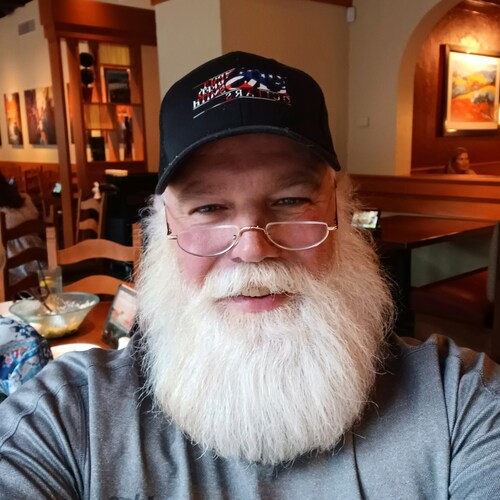 santa and metal guitar fan. free speech advocate