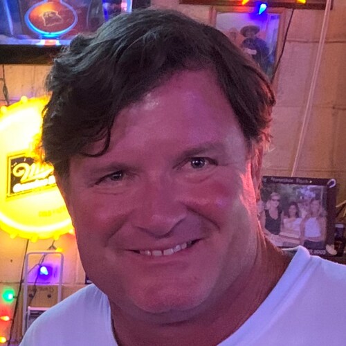 Jesus loving, full of common sense, hard working, hard playing, middle aged white male who is a "he" and cares for all people no matter the color of their skin.