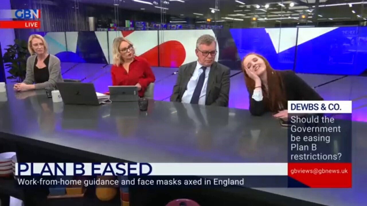 A student reacts to the announcement that Britain is removing masks. God bless this young woman.