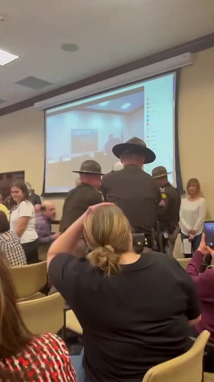 This was during a hearing at the #Utah capitol. 

He had a sticker that was to “political” (It said VOTE YES on HB60, which he took off) and a shirt that said #wethepeople and Utah Highway Patrol storm troopers Escorted him out and arrested him. #TheBigMig
@Zeus6266  @LanceMigliaccio