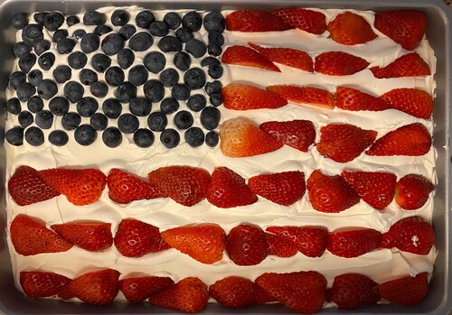 Second generation helping to make the Flag Cake!