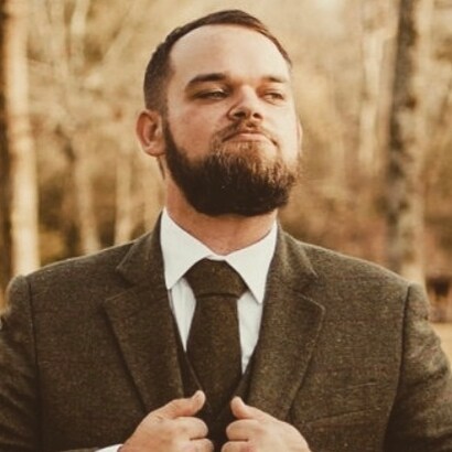 Husband, father, professional knuckle buster, former drummer, Braves fan