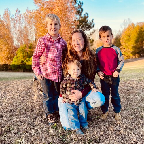 Lover of: God, my boys, and wine.