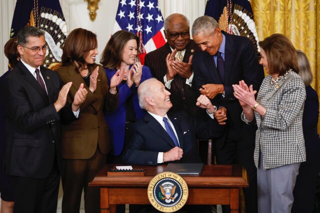 Rep. Angie Craig (Congresswomen in blue blazer behind President Biden & next to VP Harris) announced...
