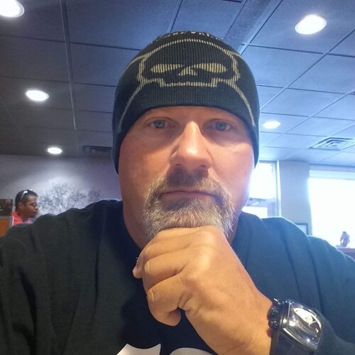 Native American.  Retired Law Enforcement. Son of a WWII Veteran.  Polymath. Warner Brothers voice actor.