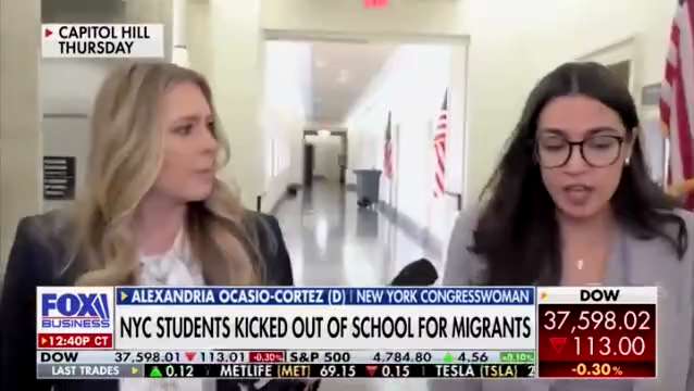 AOC is asked whether she's ok with American students being moved out of their school to house illega...