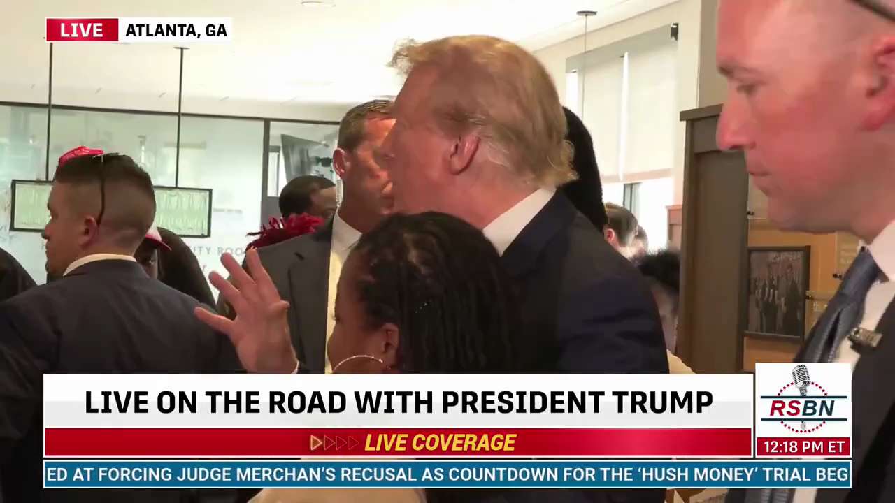 WATCH: President Trump takes photos with supporters in Atlanta during surprise stop at Chick-Fil-A

...